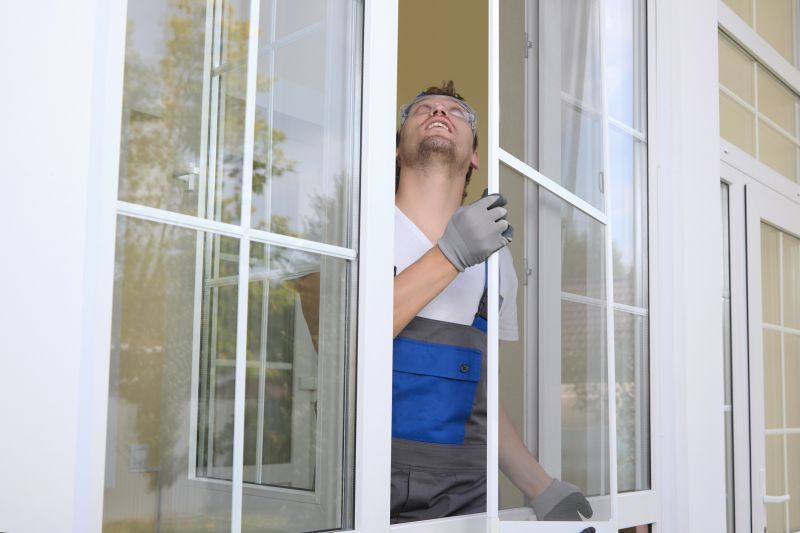 Professional Window Installer at Work